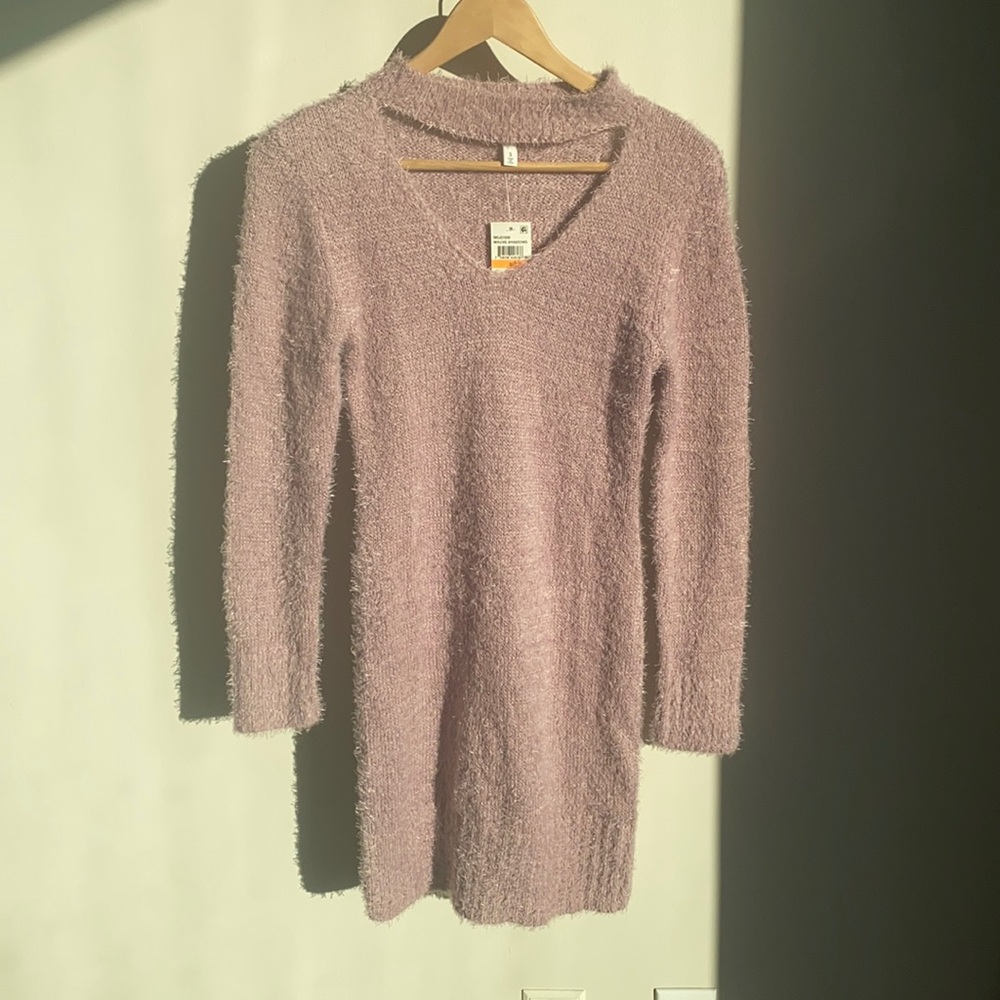 Lavender sweater dress with front cut out.
